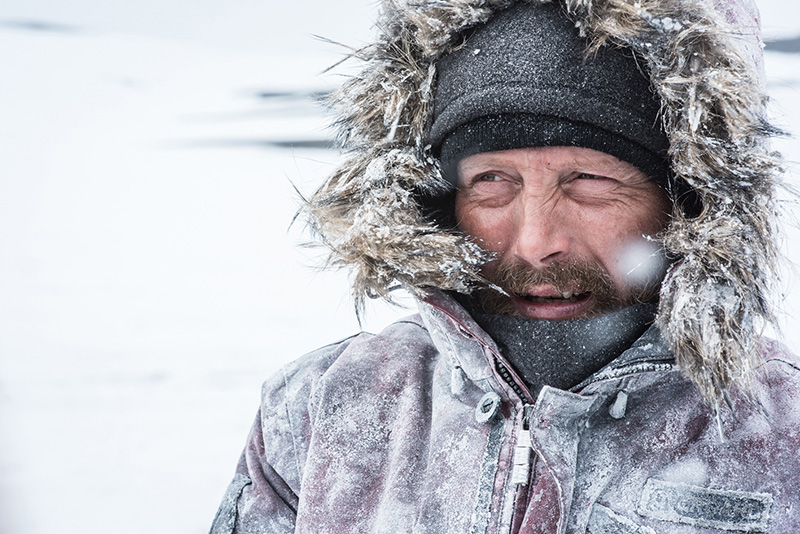 Mads Mikkelsen stars as Overgård in ARCTIC, a Bleecker Street release. Credit: Helen Sloan SMPSP / Bleecker Street