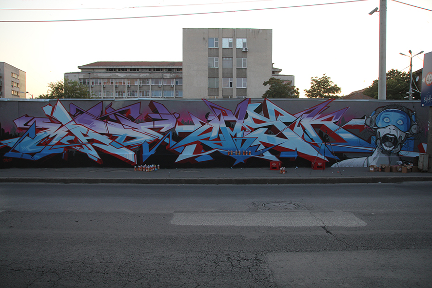 Artisti: MadC, Omsk, Caparso – Germania - Festival International de Graffiti Timisoara 2011. Locul desfășurării: Parcarea CJT Hotel Timisoara