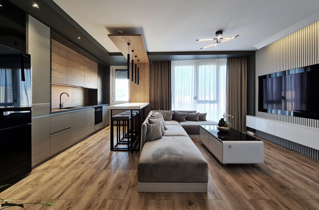 Contraste puternice şi accente din lemn. Apartament ARED by ATMSF Design